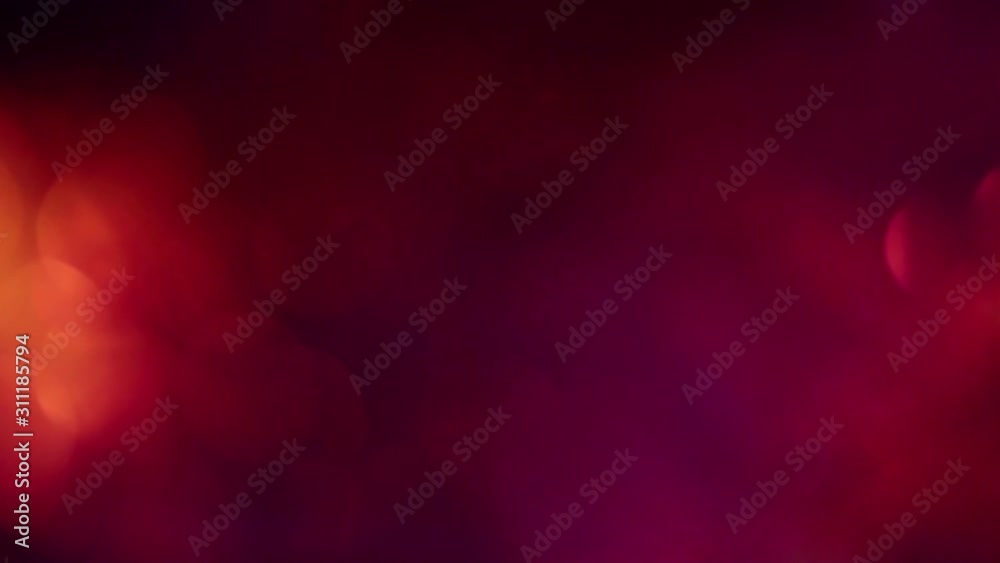Abstract bokeh blurred background with dynamic rotation motion elements in gold and blue colors