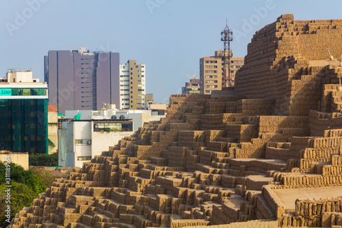 Huaca Pucllana, is a nearly 2000-year-old clay & adobe stepped pyramid from the Lima Culture, photographed in Miraflores, Lima, Peru in the summer.