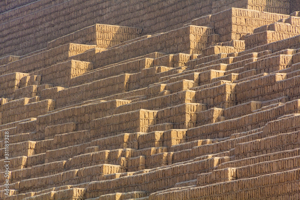 Huaca Pucllana, is a nearly 2000-year-old clay & adobe stepped pyramid from the Lima Culture, photographed in Miraflores, Lima, Peru in the summer. Huaca Pucllana, is a nearly 2000-year-old clay & adobe stepped pyramid from the Lima Culture, photographed in Miraflores, Lima, Peru in the summer.