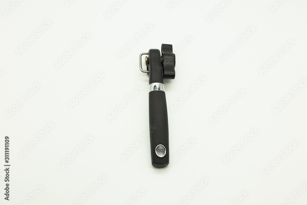 Can opener equipment for opening cans isolated on white background. Can opener equipment for opening cans isolated on white background.