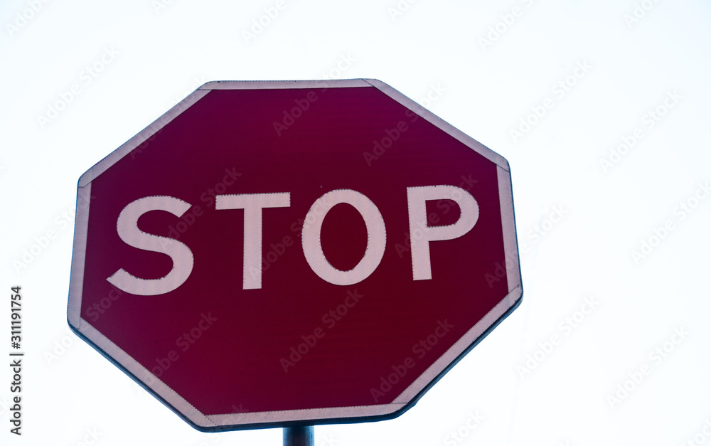 Stop road sign isolated with white background