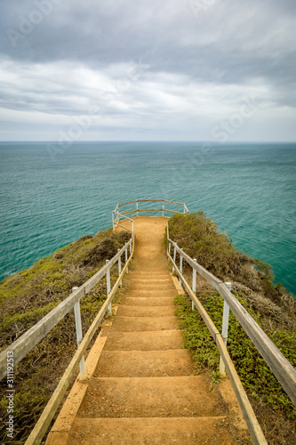 Dirt steps and railing lead down to the edge of the overlook at Muir Beach © Chris Anderson 
