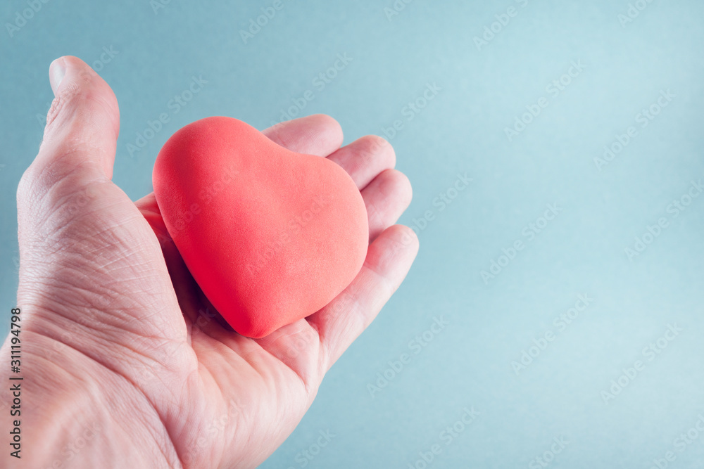 medicine concept. heart on an open palm.. medicine concept. heart on an open palm..