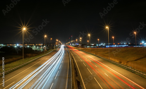 Car light trails on highway A12 in The Netherlands at night.