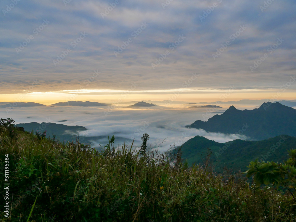 sunset in the mountains.Phu Chi Fah sea fog, Chiang Rai Province, Thailand