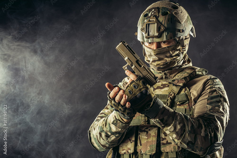 young military, soldier man holding gun wearing military wear, green camouflage and helmet on head, combatant young military, soldier man holding gun wearing military wear, green camouflage and helmet on head, combatant