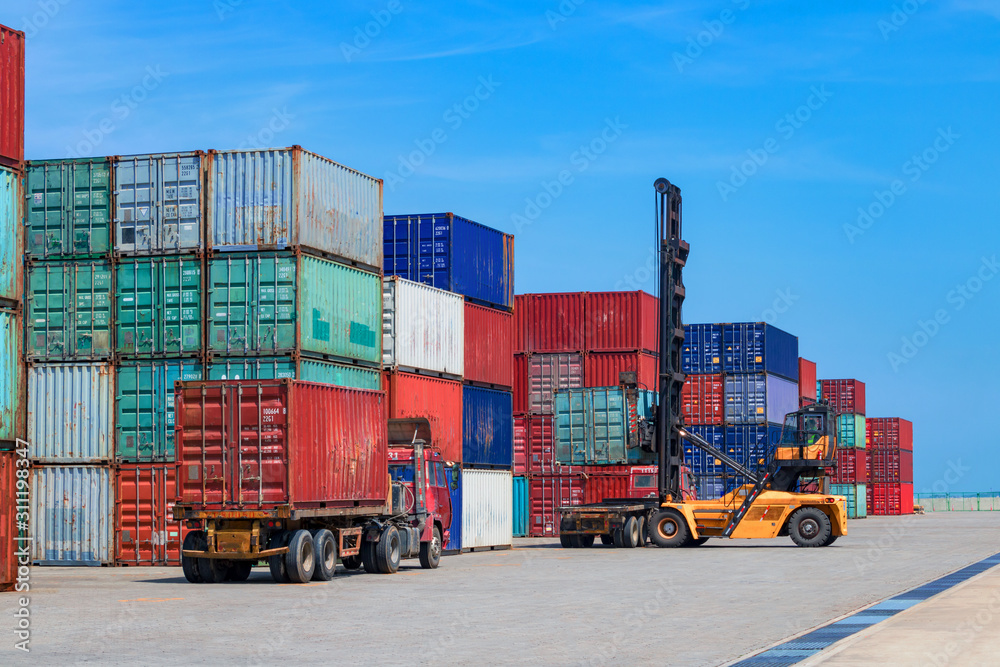 Containers on the wharf. International shipping logistics. Containers on the wharf. International shipping logistics.