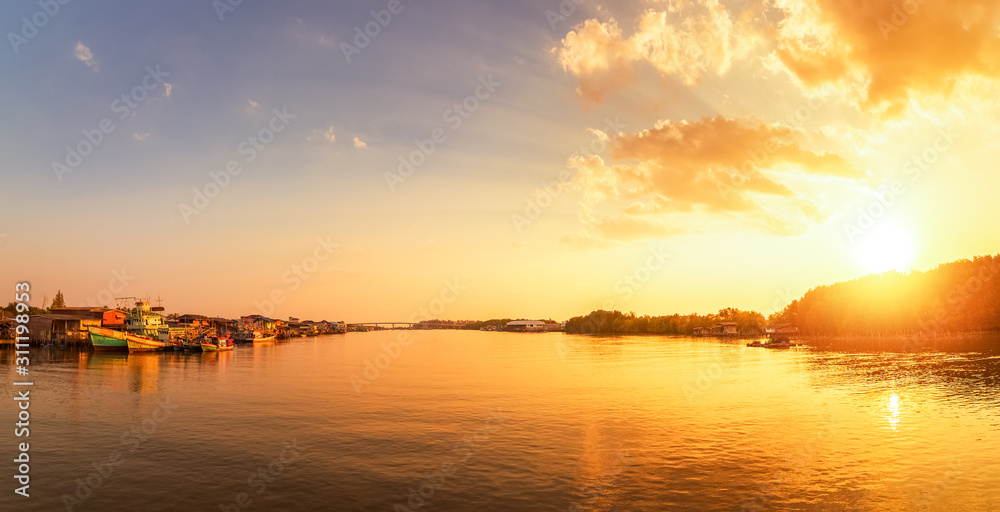 Sunset river boat silhouette landscape. River boat sunset view. Sunset river boat scene.