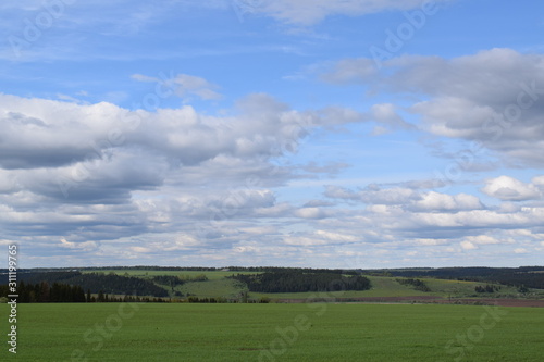 landscape with blue sky and clouds