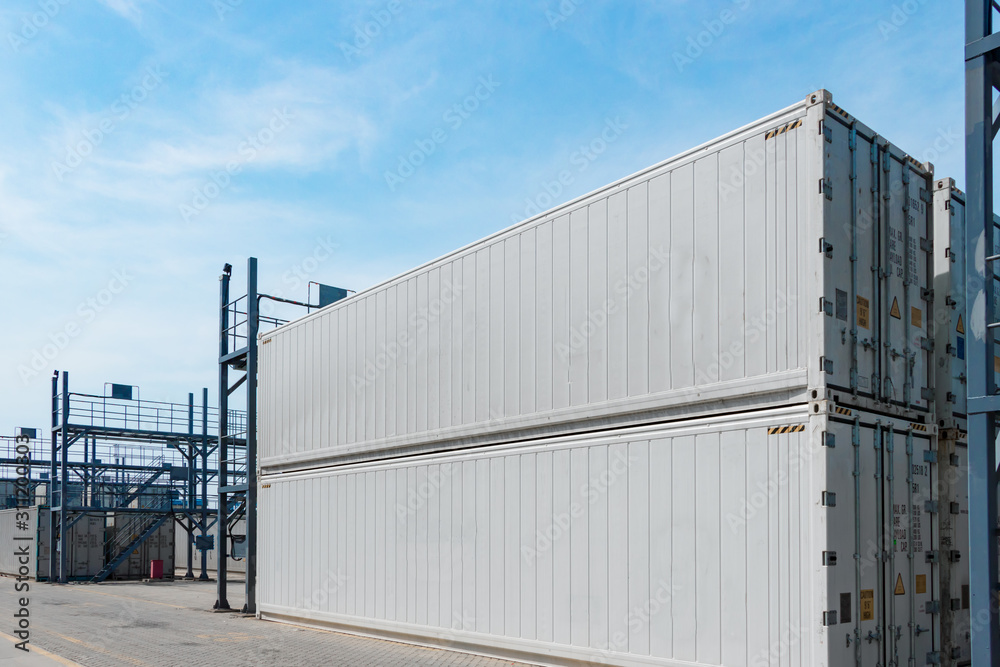 Containers on the wharf. International shipping logistics. Containers on the wharf. International shipping logistics.