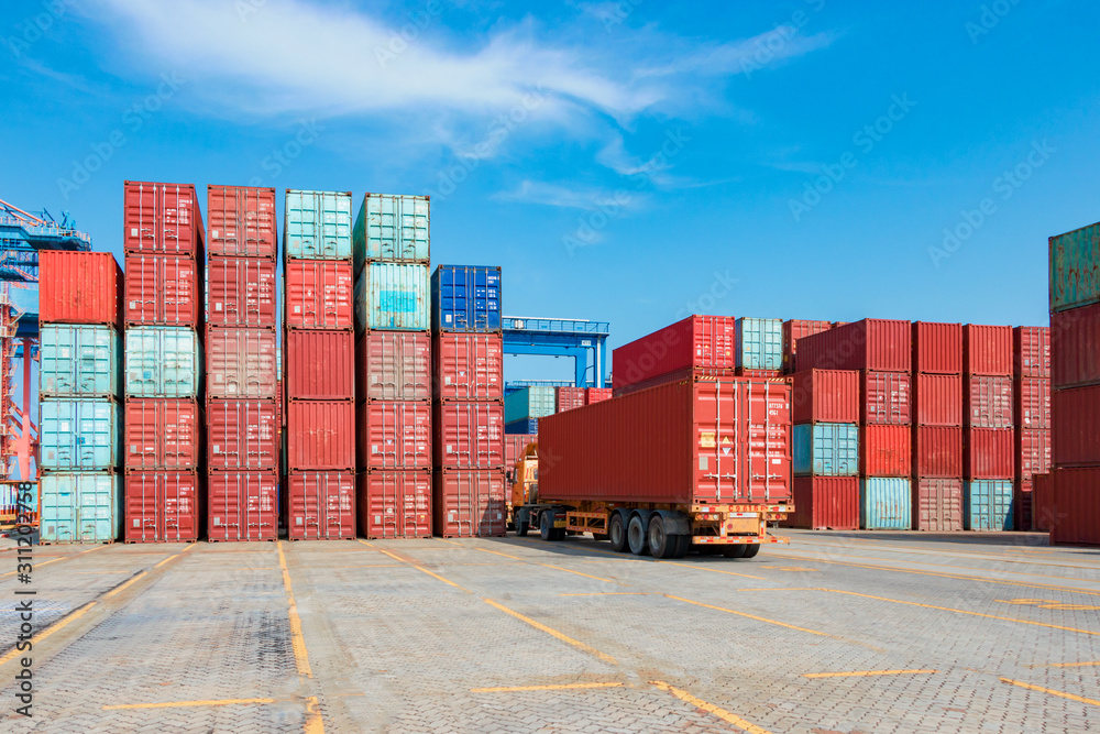 Containers on the wharf. International shipping logistics. Containers on the wharf. International shipping logistics.