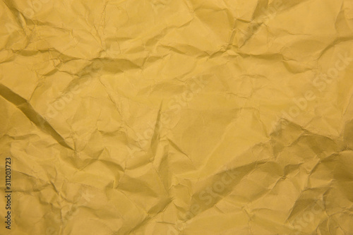 Crumpled yellow paper.