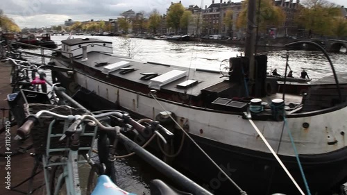 Wallpaper Mural amsterdam canal boat buildings cloudy day Torontodigital.ca