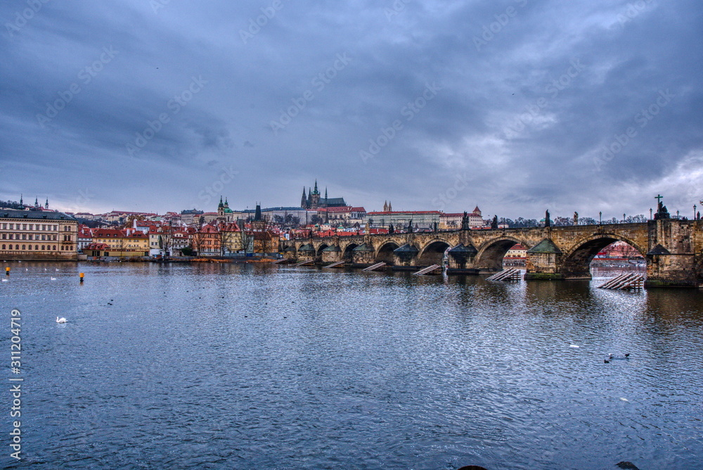krasluv bridge with castle and cathedral with beautiful cloudy sky