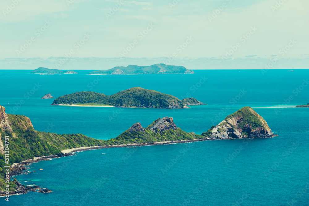 Top view island and blue water see in a day.