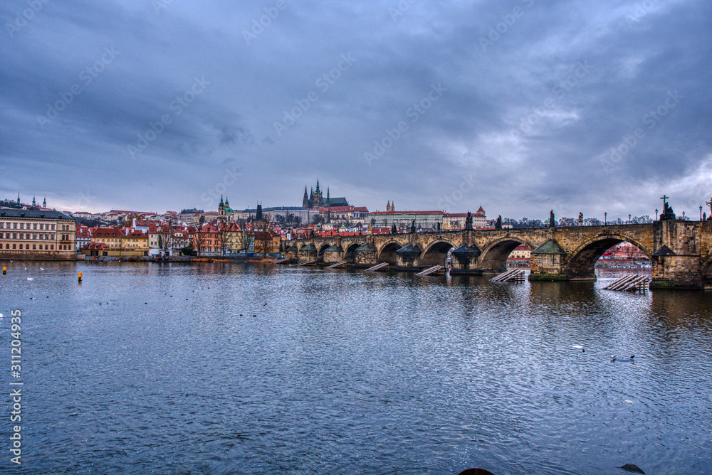 Fototapeta premium krasluv bridge with castle and cathedral with beautiful cloudy sky