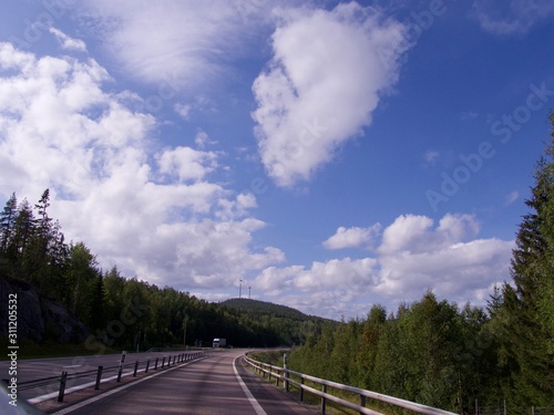 Country Road, cloudy sommar fourney in Sweden
