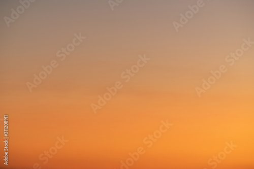 Fototapeta Naklejka Na Ścianę i Meble -  Sky gradient from blue to orange sunset