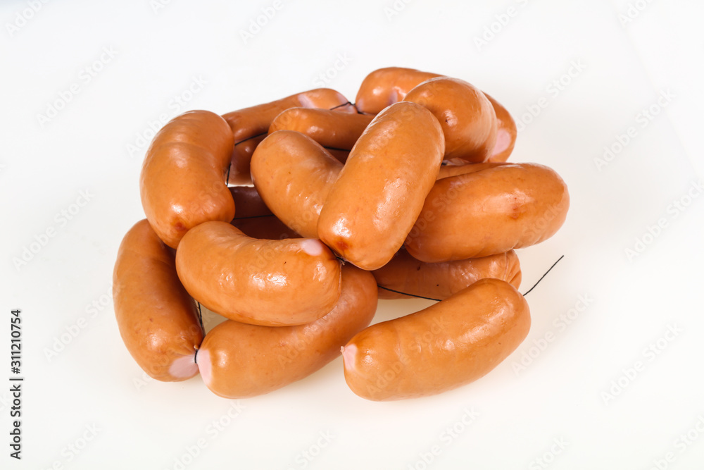 Tasty meat sausages over white background Tasty meat sausages over white background