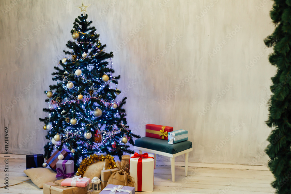 Christmas tree with presents, Garland lights new year winter home decoration Christmas tree with presents, Garland lights new year winter home decoration