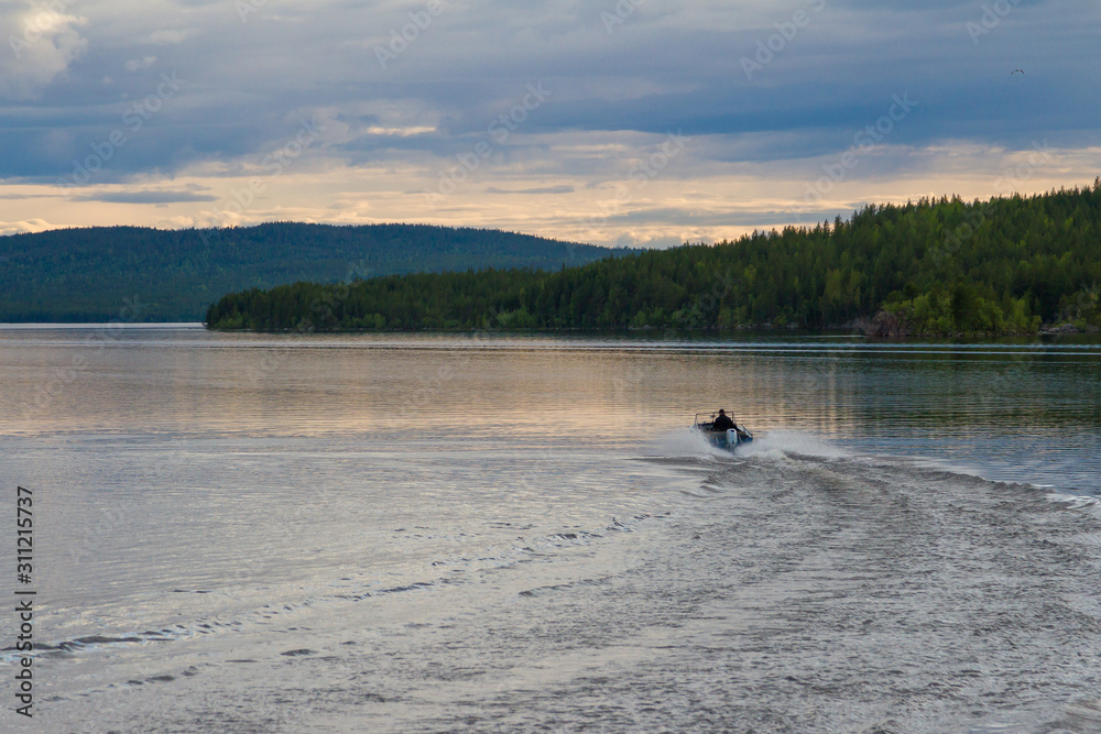 Karelian lakes at sunset and sunrise.