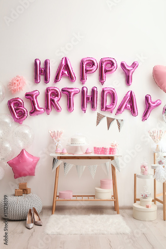 Canvas Print Phrase HAPPY BIRTHDAY made of pink balloon letters in decorated room