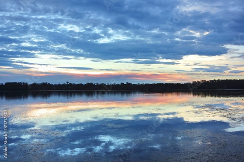 Stunning sunset reflection in lake 