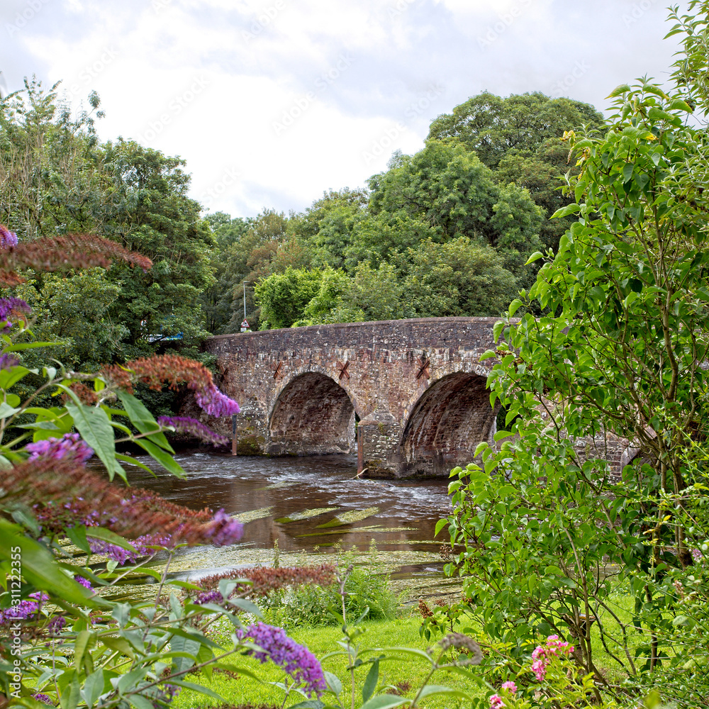 Ancient stone bridge over the River Exe at Bickleigh, Devon, England, UK. (HDR)