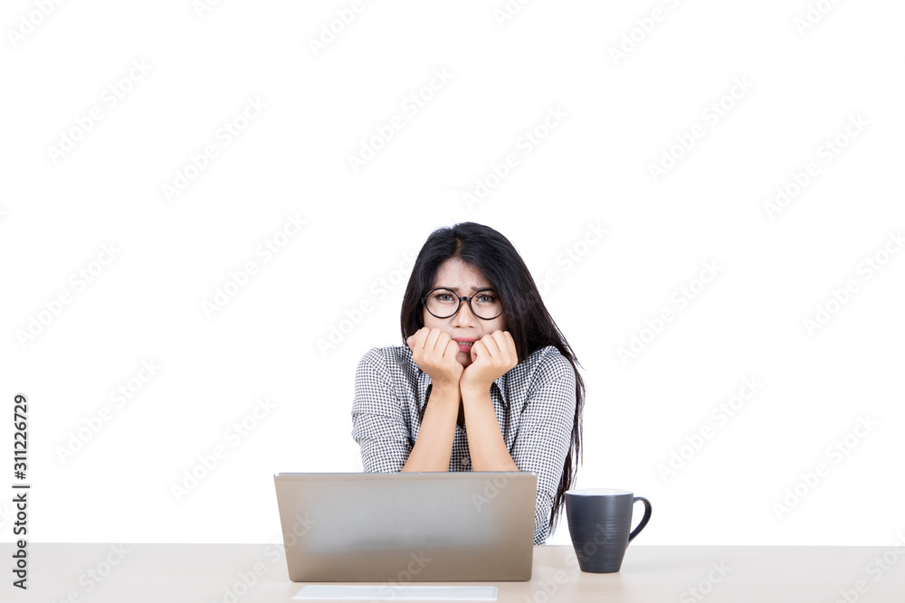 Businesswoman posing by covering her mouth cutely Businesswoman posing by covering her mouth cutely