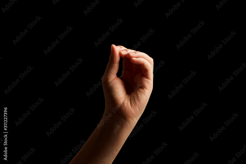 Hand Showing Sign of O Alphabet in American Sign Language (ASL), isolated on black background. Sign language Hand Showing Sign of O Alphabet in American Sign Language (ASL), isolated on black background. Sign language