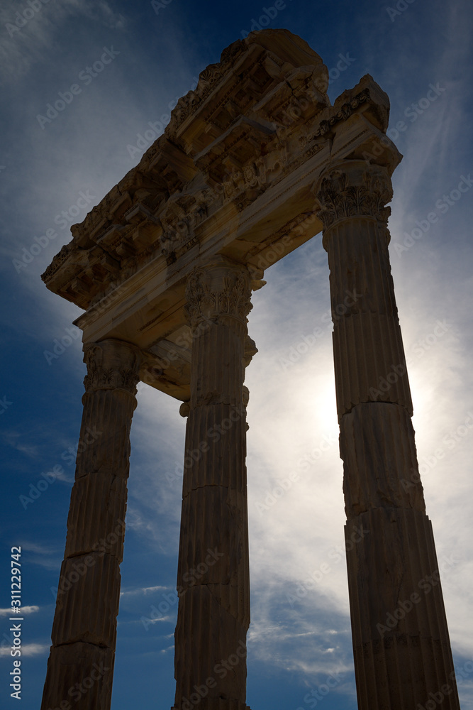 Silhouette of corinthian columns and lintel ruins of Trajan Temple at Pergamon Bergama Turkey
