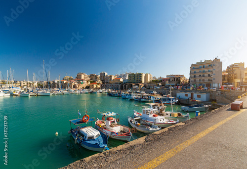 Day foto of old venetian harbor with boats in Heraklion © velishchuk