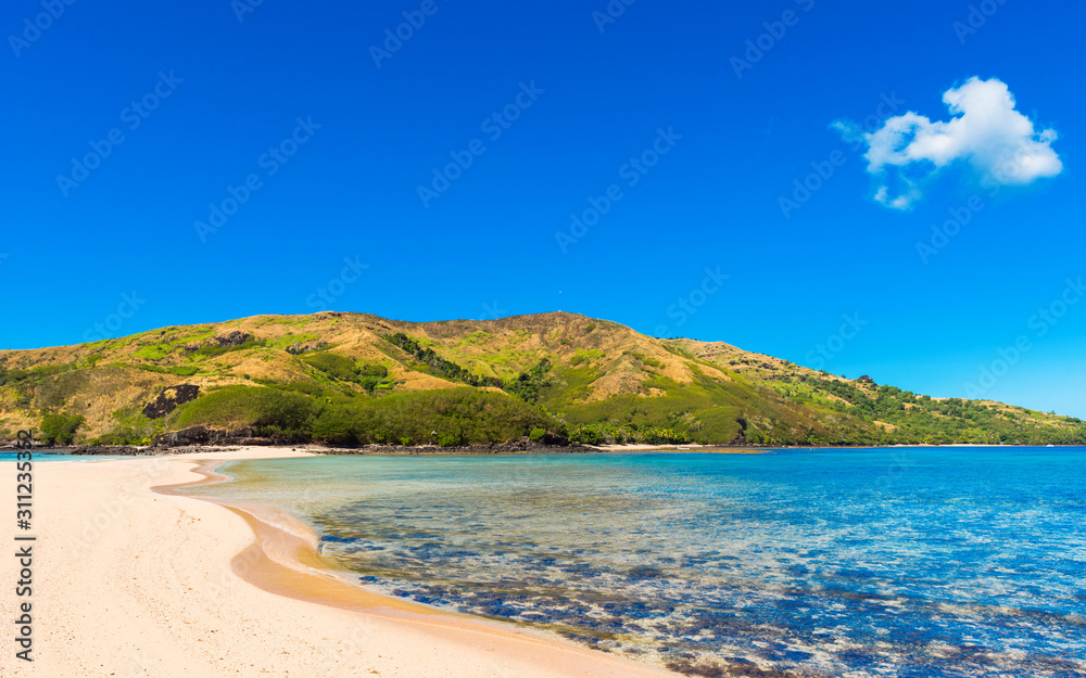 View of the sandy beach of the island, Fiji. Copy space for text.