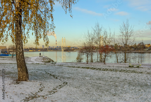 Embankment of the river Neva. Piscatorial.Saint-Petersburg. Russia. 23.10.2019. The first snow that fell in the month of October.