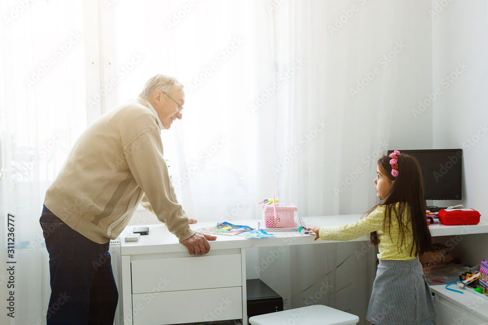 grandfather and granddaughter do her homework grandfather and granddaughter do her homework