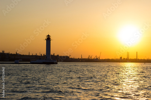 Lighthouse in the port of the Black Sea Bay