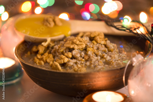 Christmas kutia from wheat, raisins and nuts, selective focus