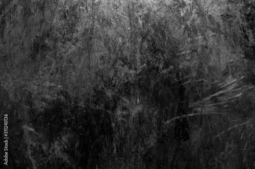 Black and white scratched texture of rusty old surface of dark dirty metal