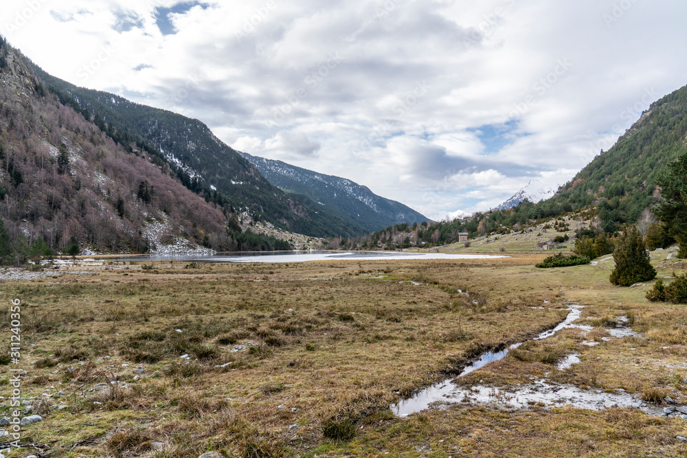 Llebreta lake in National Park of Aigüestortes and lake of Sant Maurici.