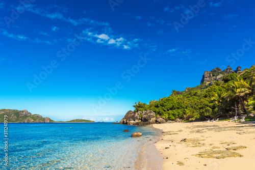 View of the sandy beach of the island, Fiji. Copy space for text. © ggfoto