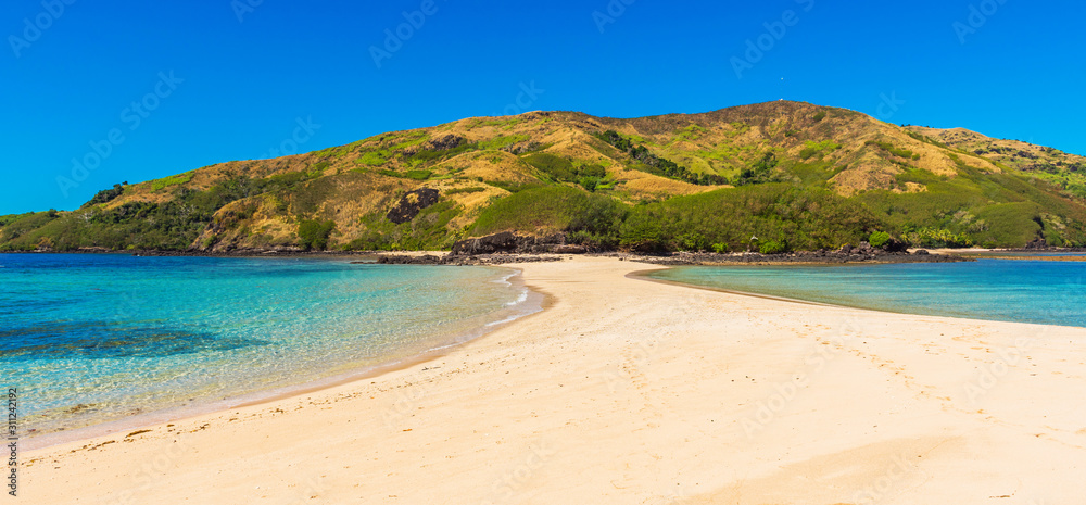 View of the sandy beach of the island, Fiji. Copy space for text.