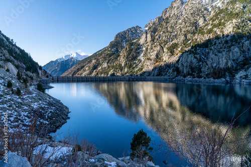 Cavallers reservoir in National Park of Aigüestortes and lake of Sant Maurici.