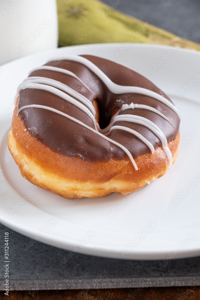 brown iced ring doughnut brown iced ring doughnut