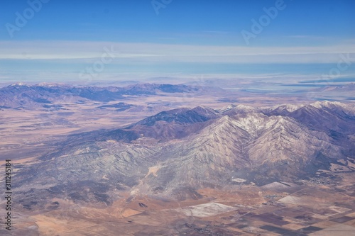 Rocky Mountains, Oquirrh range aerial views, Wasatch Front Rock from airplane. South Jordan, West Valley, Magna and Herriman, by the Great Salt Lake Utah. United States of America. USA.