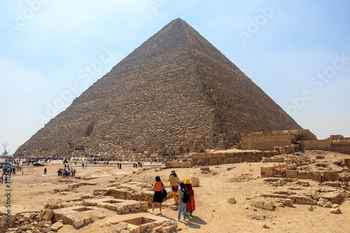 Giza, Egypt - April 19, 2019: The ancient Egyptian Pyramid of Khufu with ruins, tombs and monuments in Giza, Cairo, Egypt