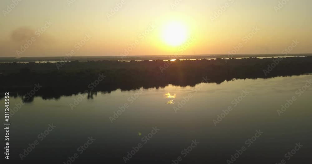 Sunset in the Rio Negro forms the largest river archipelogues in the world in Anavilhanas National Park, in the middle of the Amazon rainforest. Amazonas, Brazil Sunset in the Rio Negro forms the largest river archipelogues in the world in Anavilhanas National Park, in the middle of the Amazon rainforest. Amazonas, Brazil