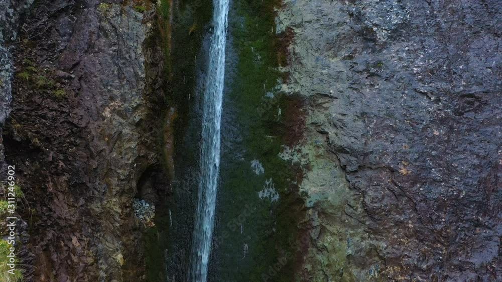 4K UHD Aerial view of tiny cold water waterfall stream in Poland Tatra mountains National park. 4K UHD Aerial view of tiny cold water waterfall stream in Poland Tatra mountains National park.