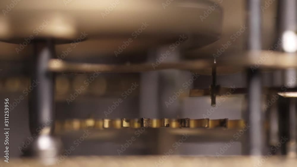 old clock mechanism with metal gears macro shot slow motion old clock mechanism with metal gears macro shot slow motion