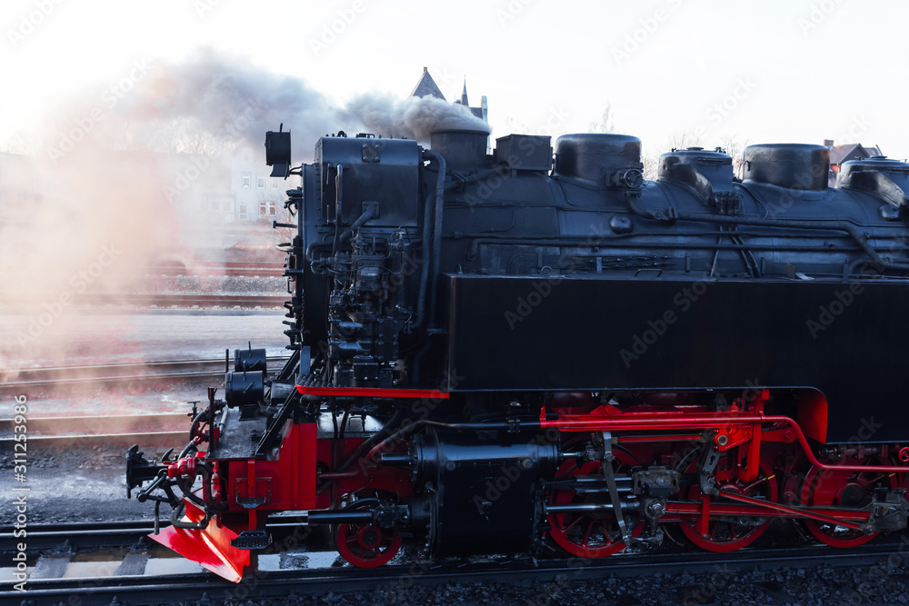 Fototapeta premium historic steam train in the winter
