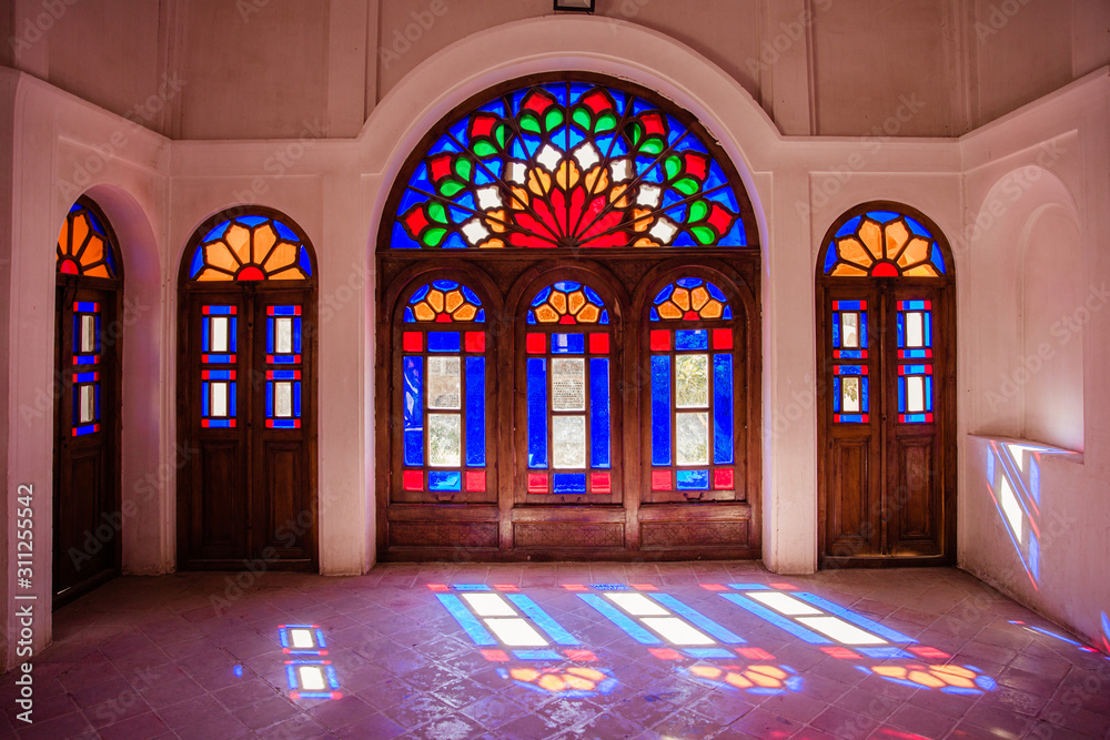 beautiful multi-colored stained-glass windows in the houses and mosques ...